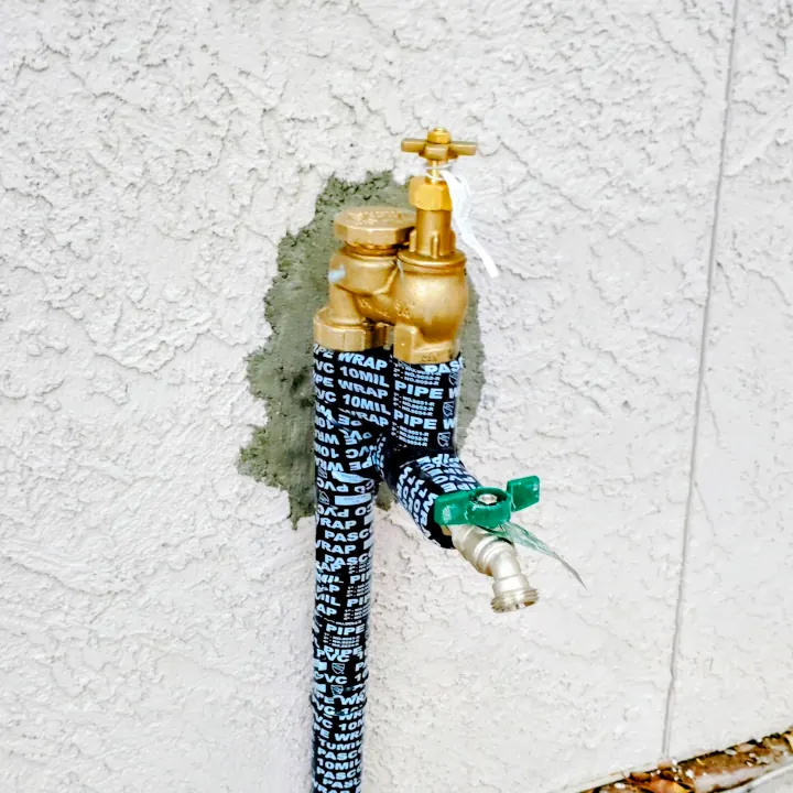 Front yard irrigation system in Scottsdale with lush green landscaping